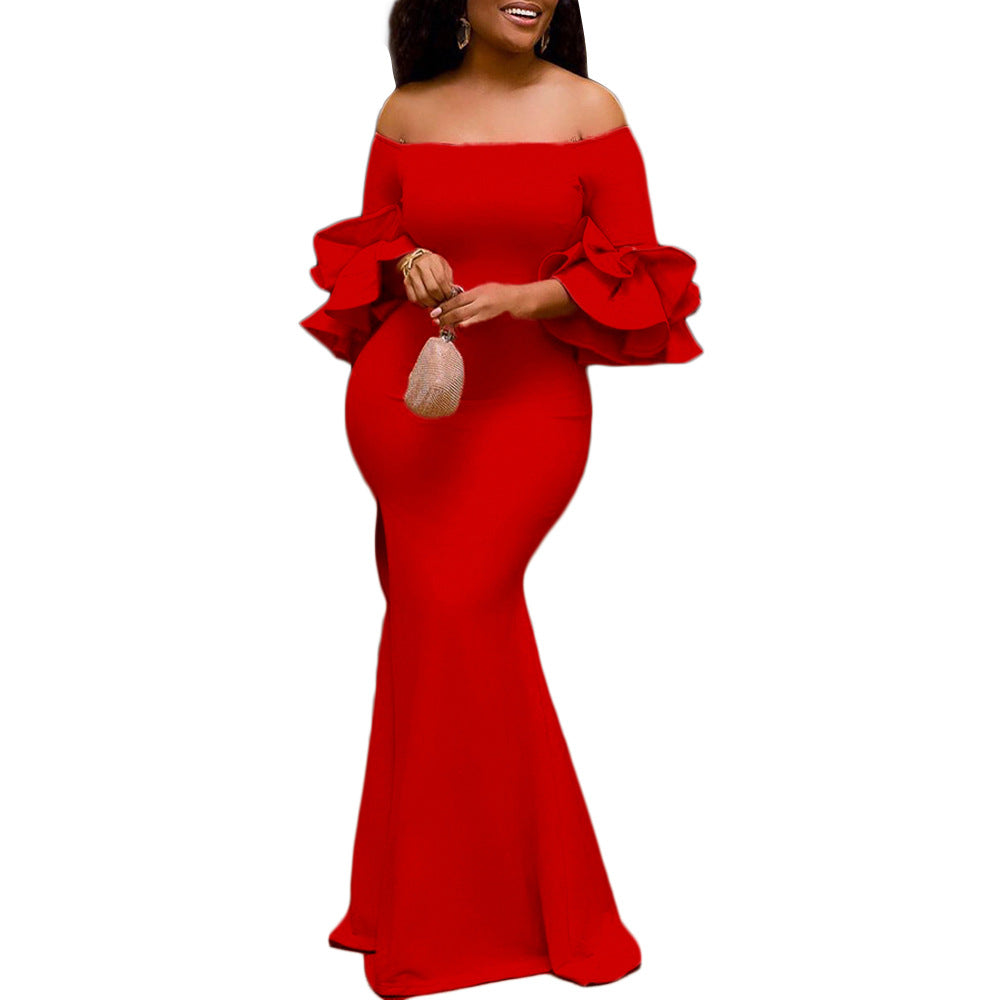 Dame Elegant aftenkjole med off-shoulder design og voluminøse ærmer Stilla