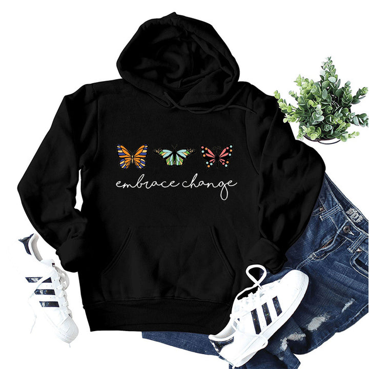 Dame hoodie med inspirerende sommerfuglemotiv og motiverende budskab Stilla
