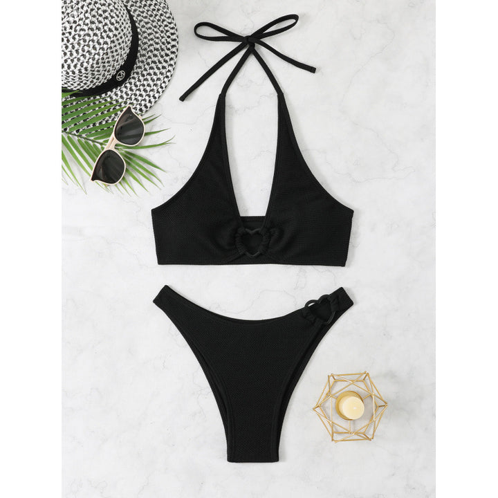 Dame bikini-sæt med hjerte-detaljer og trendy design Stilla