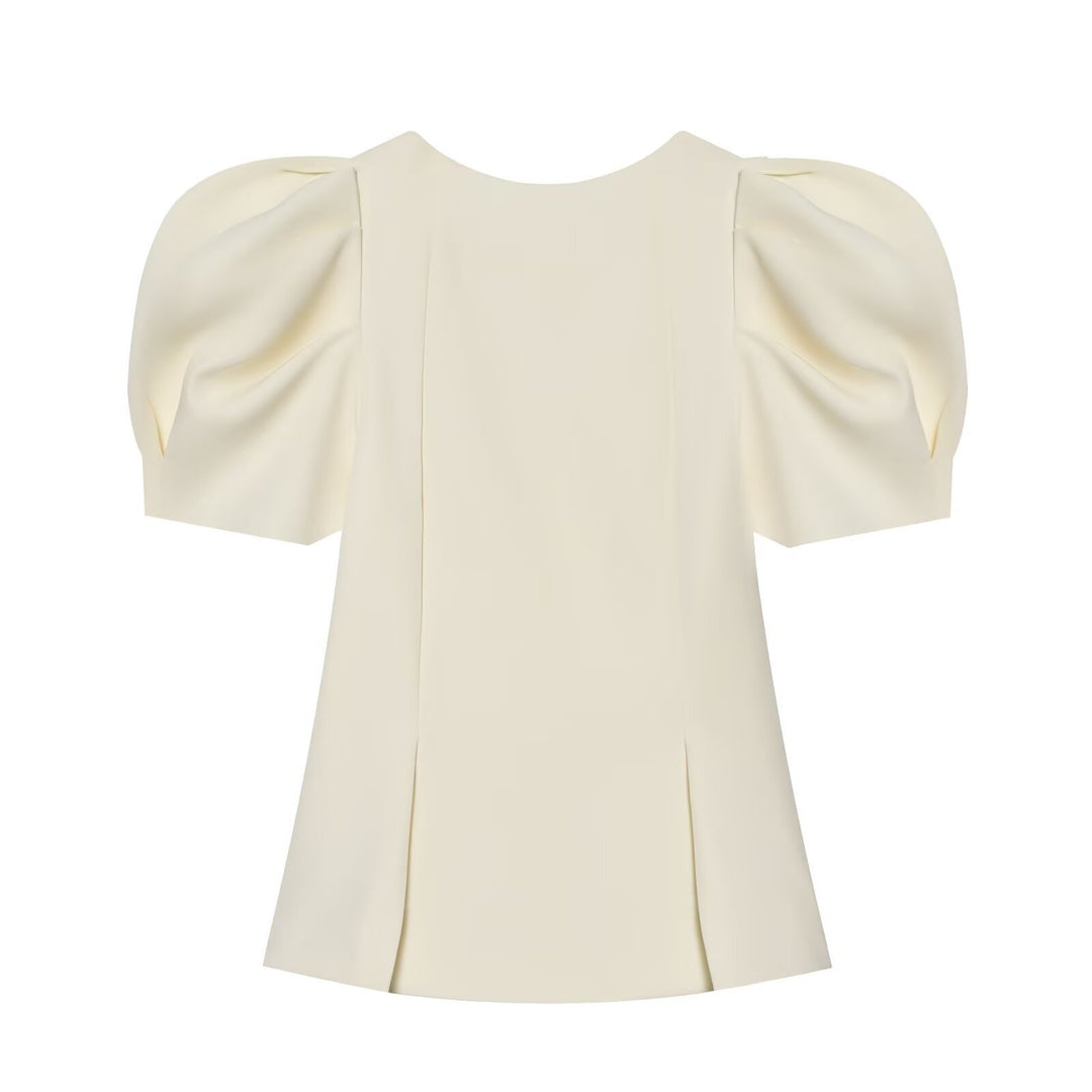 Damebluse med puffærmer og elegant snit Skovae