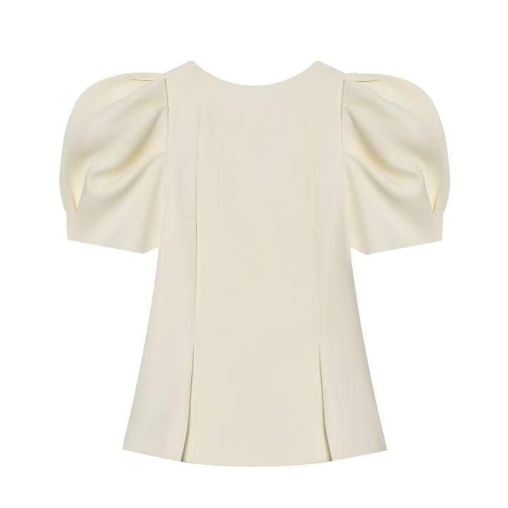 Damebluse med puffærmer og elegant snit Skovae