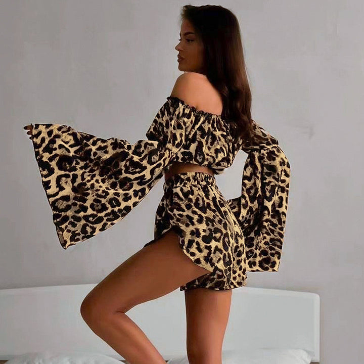 Dame Off-Shoulder Crop-Top med voluminøse ærmer og animalisk mønster Stilla