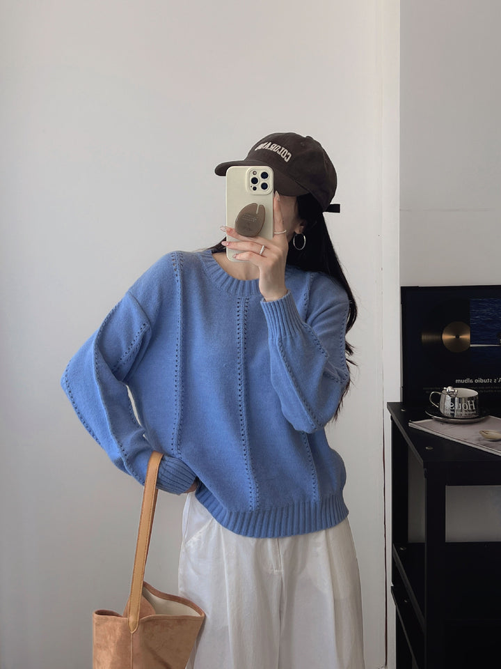 Kvinders chunky strikket sweater med en feminin silhuet og tekstureret design Stilla