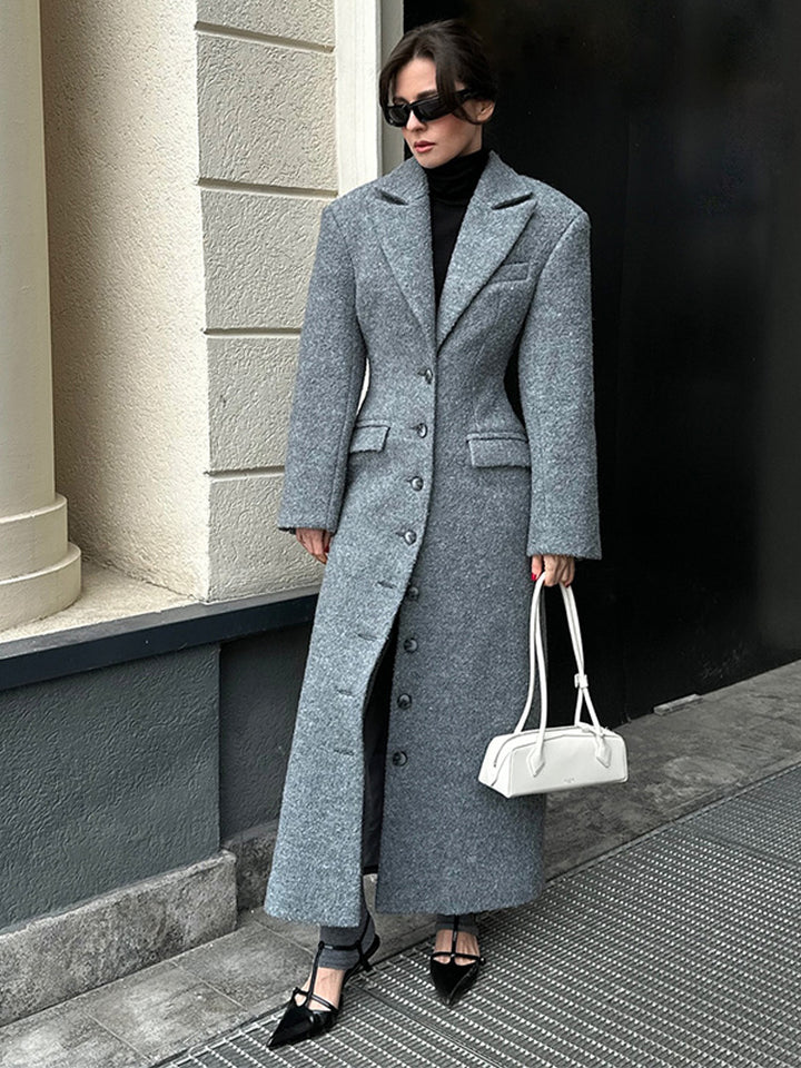 Dame elegant uldfrakke med struktureret design og praktiske lommer Stilla