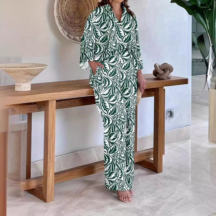 Dame Elegant og luftig strandkombination med florale mønstre Stilla