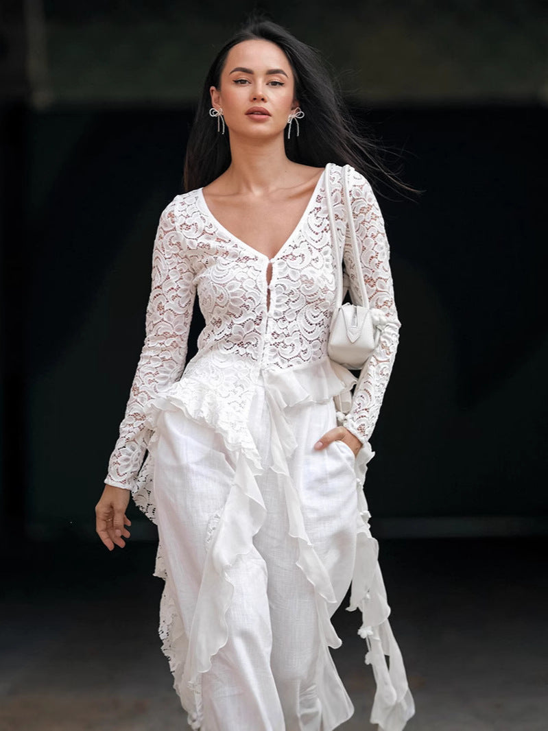 Dame chiffon-bluse med romantiske flæsedetaljer og elegant knapdesign Stilla