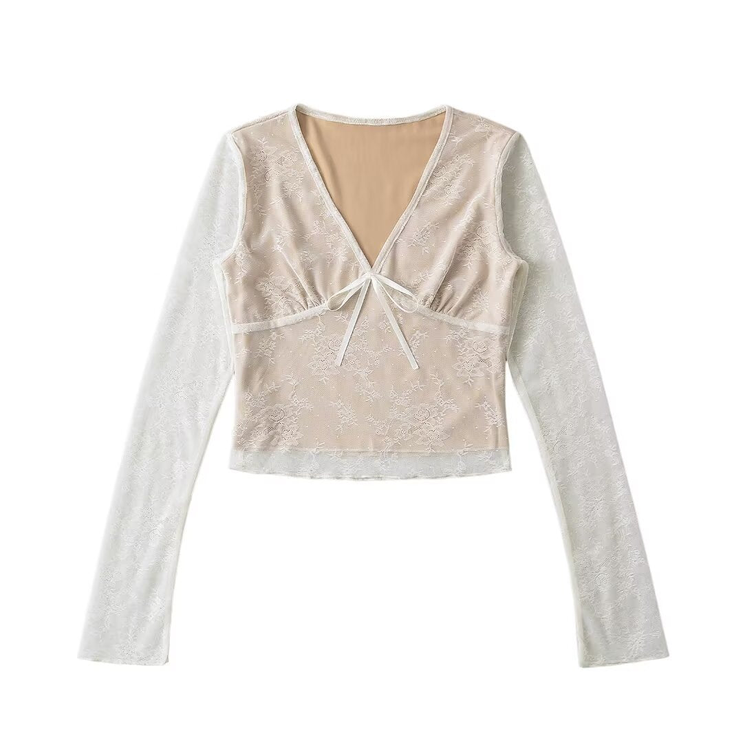 Dame spids top med elegante snøre detaljer og lange ærmer Stilla