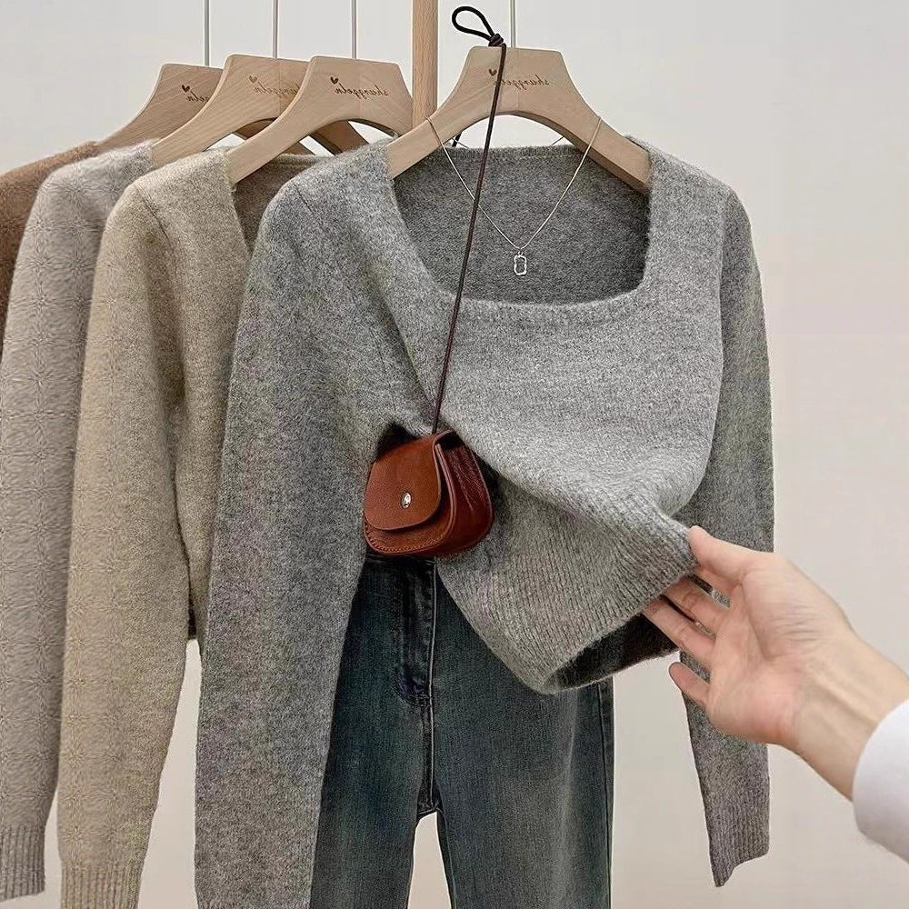 Kvinders fashionable sweater med bred rund halsudskæring og fin tekstur Stilla