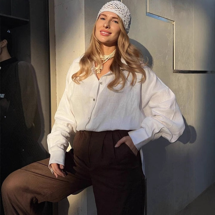 Dame luftig linned blouse med stilfuldt knudedetalje og lange ærmer Stilla