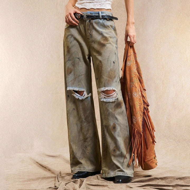 Kvindernes bredskårne jeans med slidte detaljer Stilla