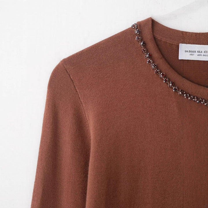 Kvinders fashionable strikket cardigan med elegant perleudsmykning Stilla