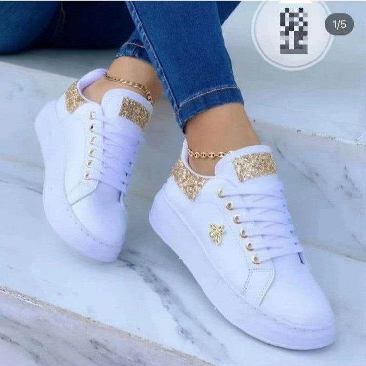 Dame mode sneakers med glitrende accenter og åndbart overmateriale Stilla