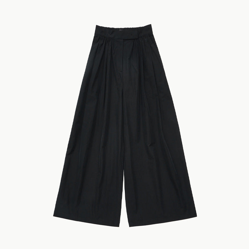 Dame Bredskårede High-Waist-bukser med elegant plisseret struktur og sidelommer Stilla