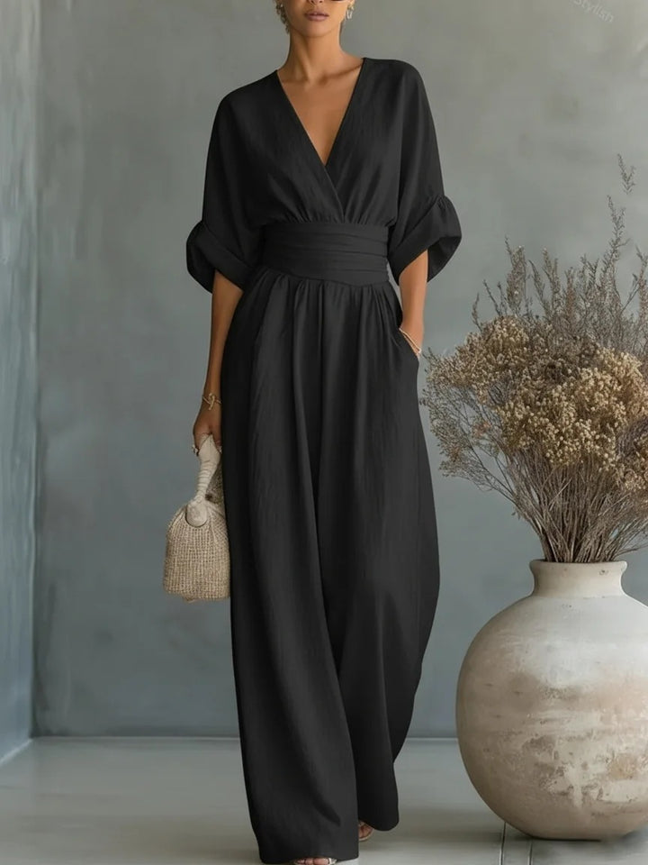 Dame jumpsuit med elegant V-udskæring og bredt ben Skovae