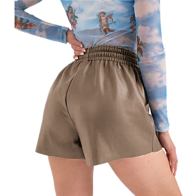 Dame Mode Kort shorts med elastisk talje og knapdetaljer Stilla