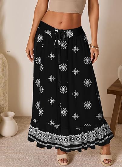 Dame jumpsuit med blomstertryk og elastisk talje