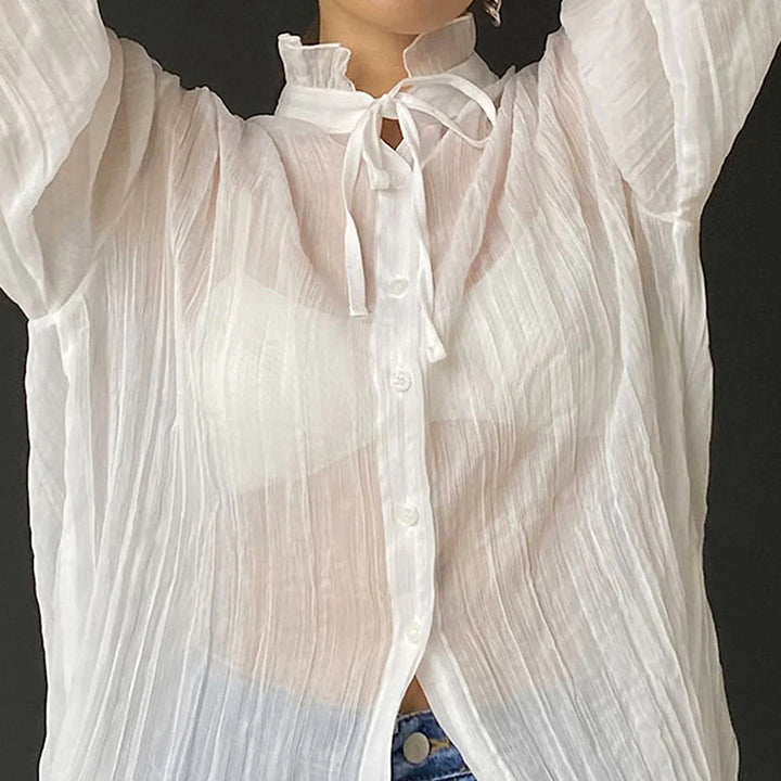 Dame langærmet bluse med elegant ståkrave og fine flæsedetaljer Stilla