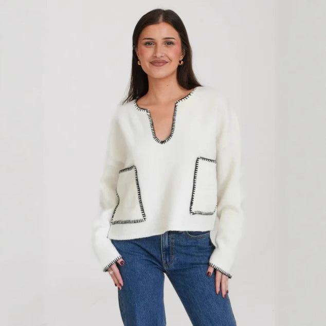 Kvinders hyggelige cropped sweater med asymmetrisk design og praktiske lommer Stilla