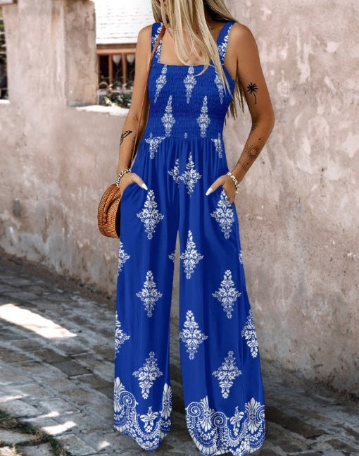Dame jumpsuit med elastisk taljebånd og blomsterdekorationer Skovae