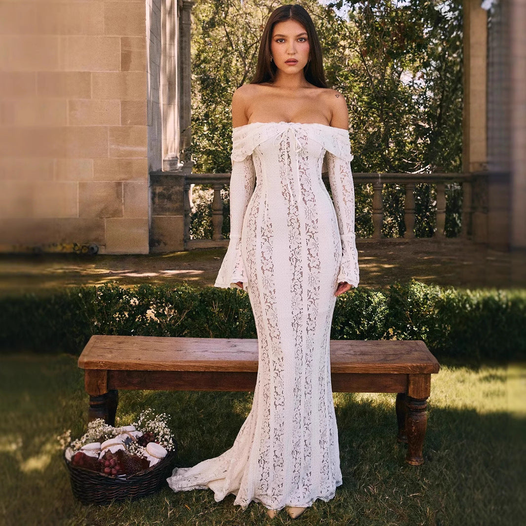 Dame spidsedragt med off-shoulder design og lange ærmer Stilla