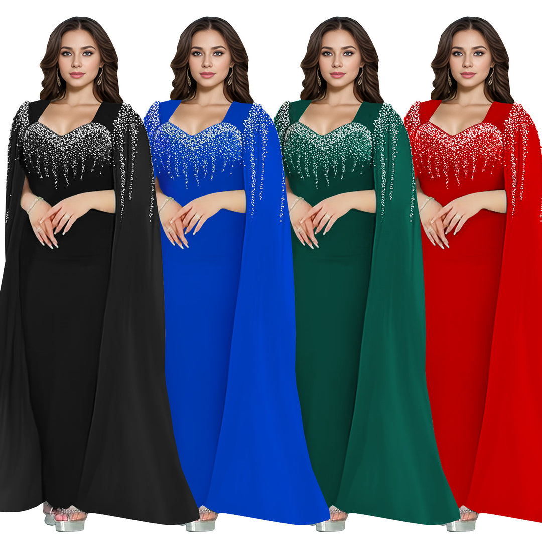 Dame Elegant aftenkjole med ædel kappe og glitrende detaljer Stilla