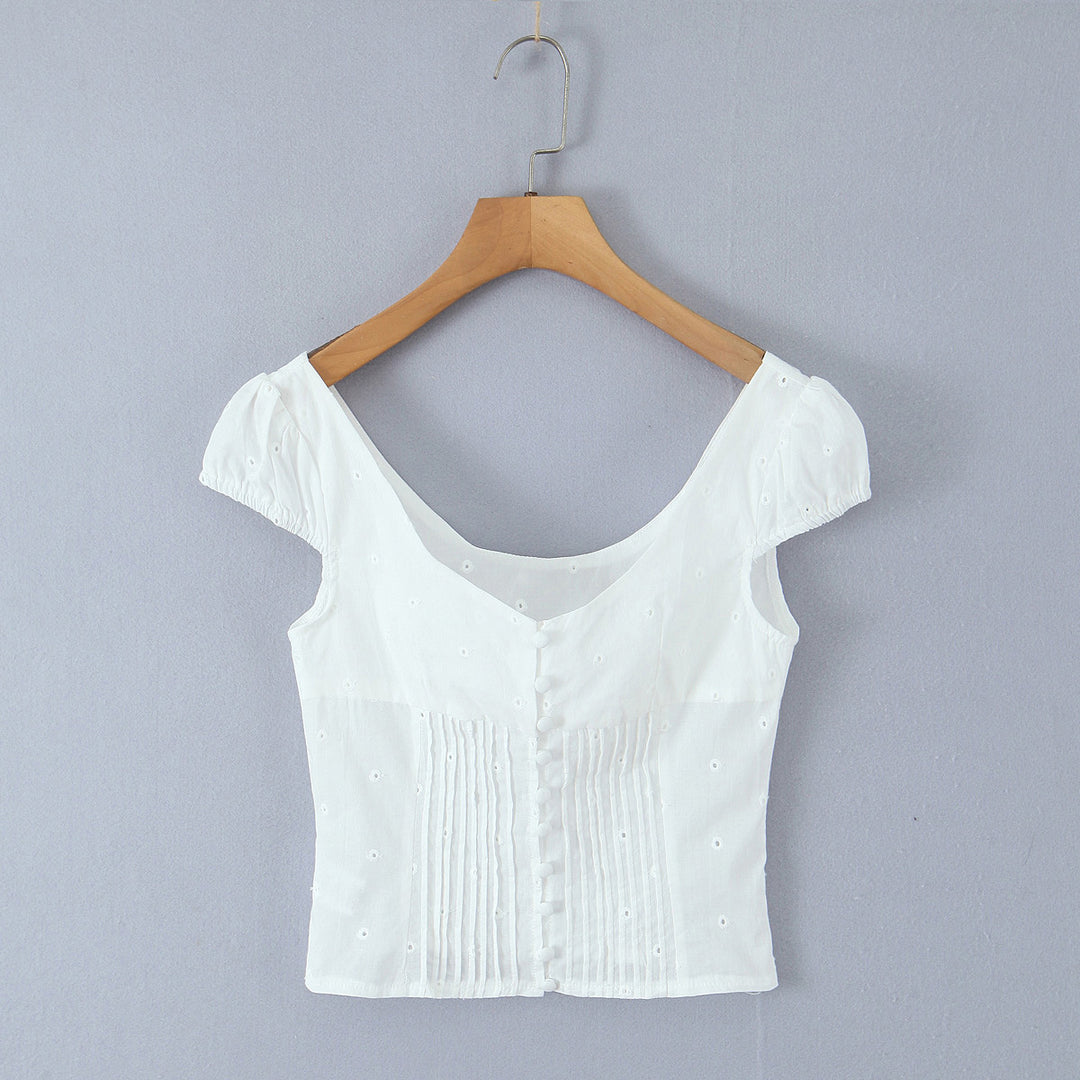 Dame legesygt crop-top med volangdetaljer og knaplukning Stilla