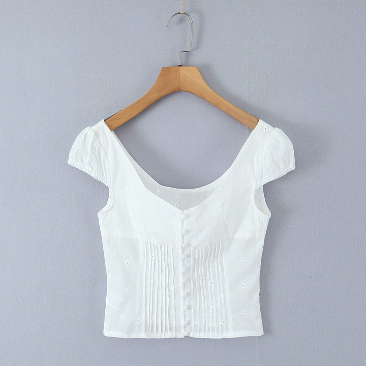 Dame legesygt crop-top med volangdetaljer og knaplukning Stilla