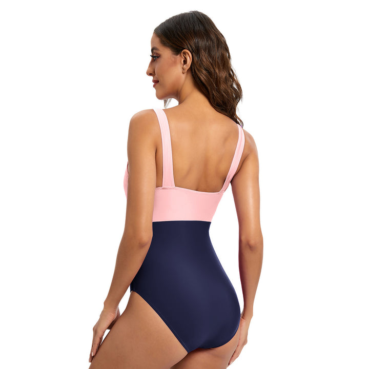 Dame one-piece badedragt med stilfuldt farveblokdesign og støttende snit Stilla