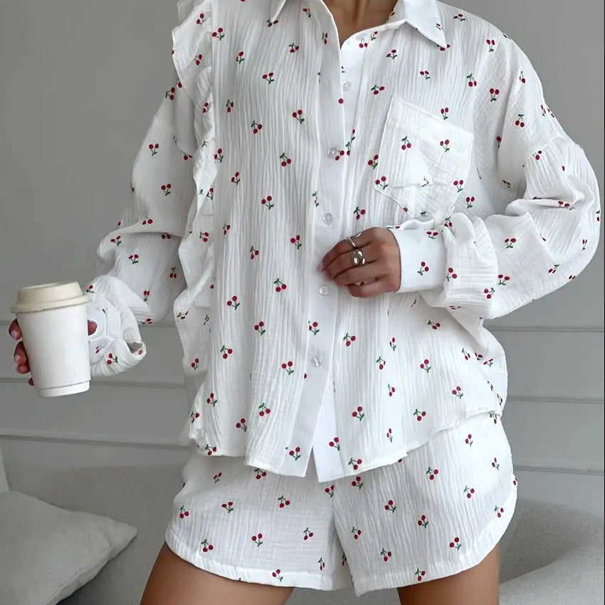 Dames bluse- og shorts-sæt med flæse detaljer og blomster mønster Stilla