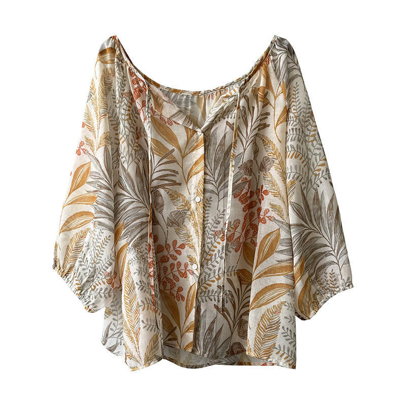 Damebluse med blomstertryk og justerbart bindingbånd Stilla