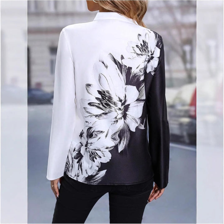 Damebluse med elegant blomsterdesign Stilla