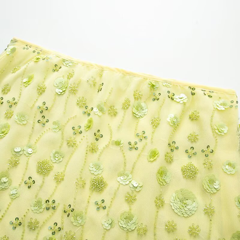 Dame mini skirt med glitrende palietter og blomstret design Skovae
