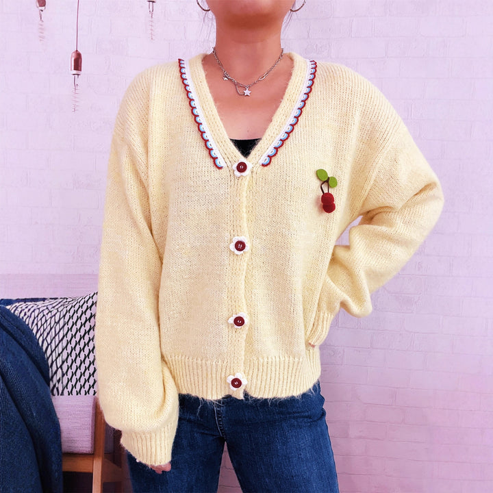 Kvinders hyggelige cardigan med legende blomstermønster og knapdetaljer Stilla