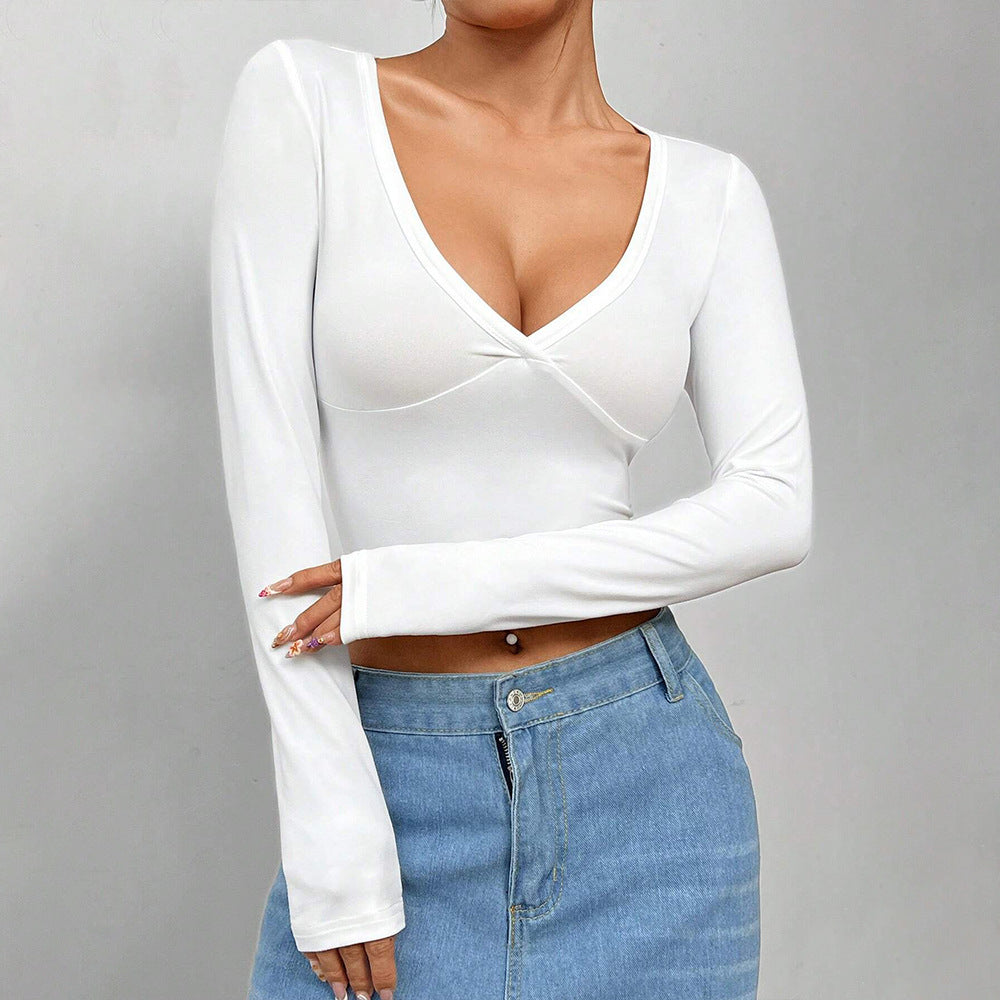 Kvinders kortærmet crop top med dyb V-hals og elegant indpakningsdesign Stilla