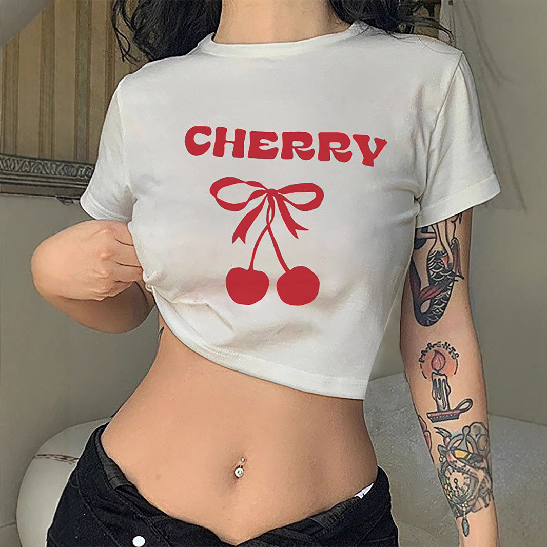 Damer Crop-T-Shirt med legende kirsebærmotiv og elegant sløjfeprint Skovae