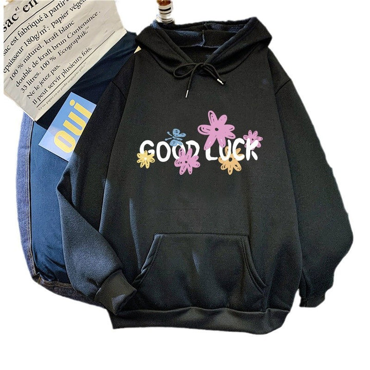 Dame hoodie med munter design og trykte bogstaver Skovae
