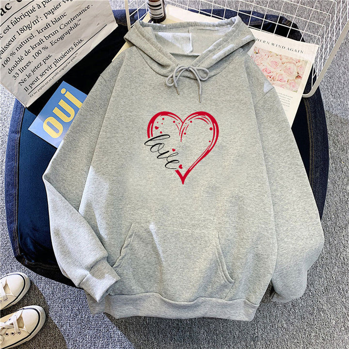 Kvinders hoodie med kreativ hjerteprint og blød indvendig foring Skovae