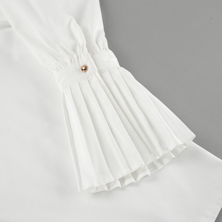 Dame elegant Bluse med plisserede ærmer og knaplukning Stilla