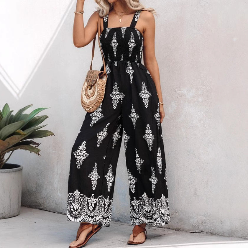 Dame jumpsuit med elastisk taljebånd og blomsterdekorationer Skovae