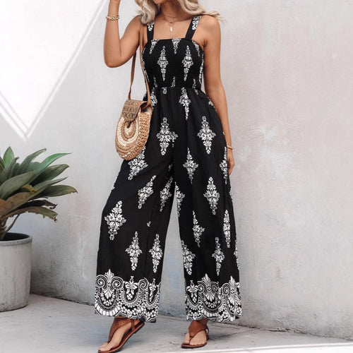Dame jumpsuit med elastisk taljebånd og blomsterdekorationer Skovae