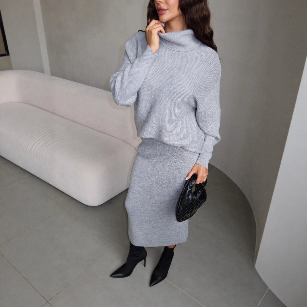 Kvinders strik ensemble med kort sweater og lang nederdel Stilla