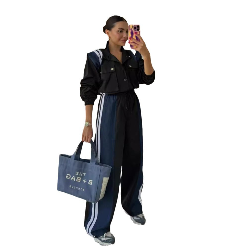 Dame sporty jumpsuit med sofistikeret snoreliv og kontraststriber Stilla