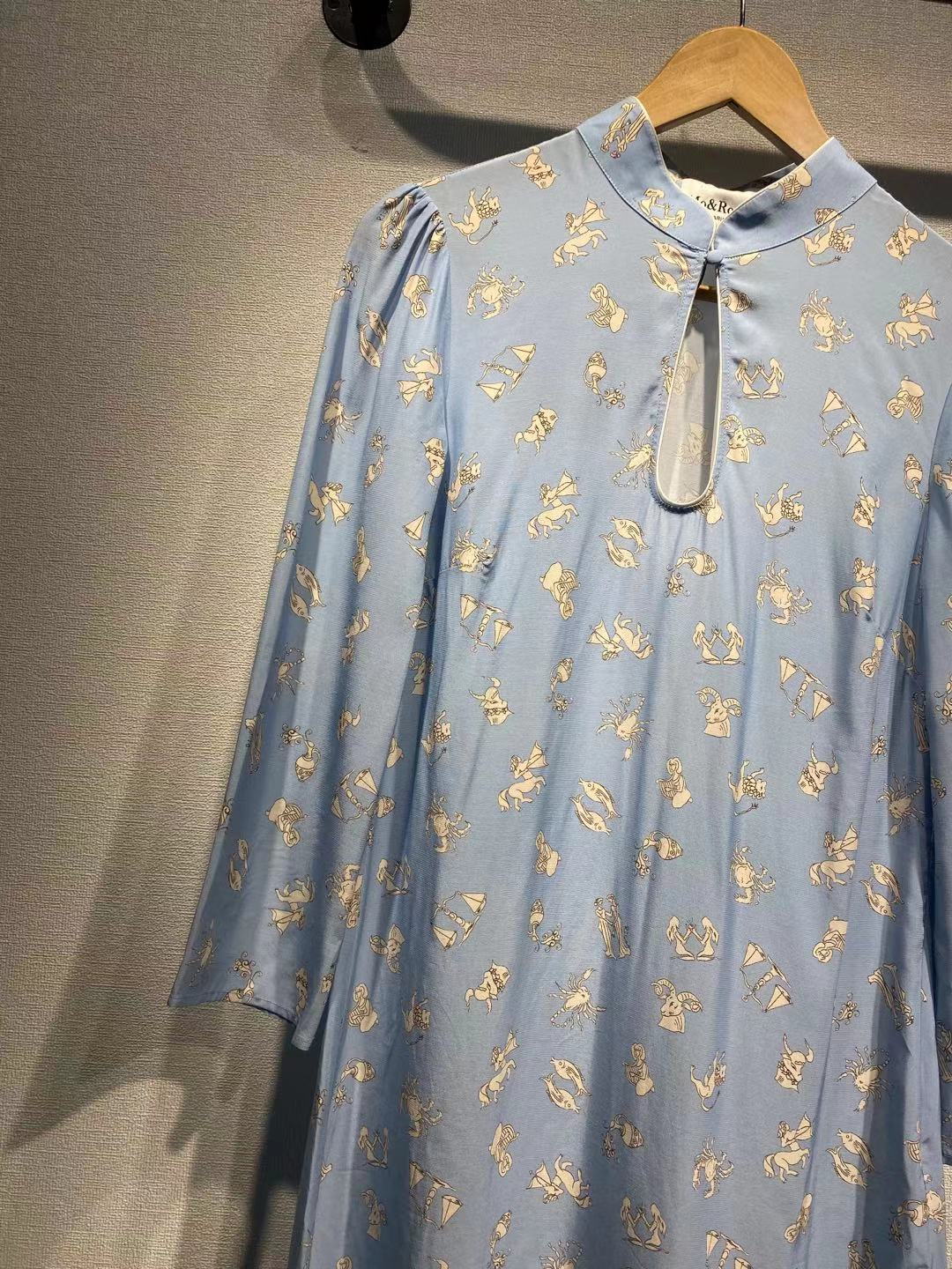 Dame tunika med legende dyremotiv og elegant ståkrave Stilla