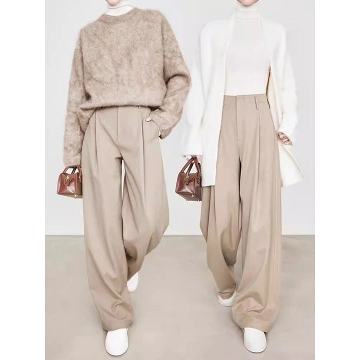 Dame elegant lang cardigan med sidelommer og fin struktur Stilla