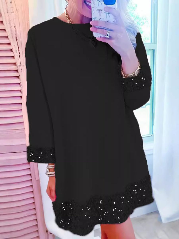 Damekjole med elegante spidsedetaljer og afslappet snit Stilla