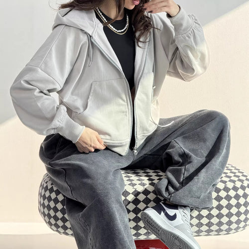 Dame afslappet zip hoodie med brede ærmer og praktiske lommer