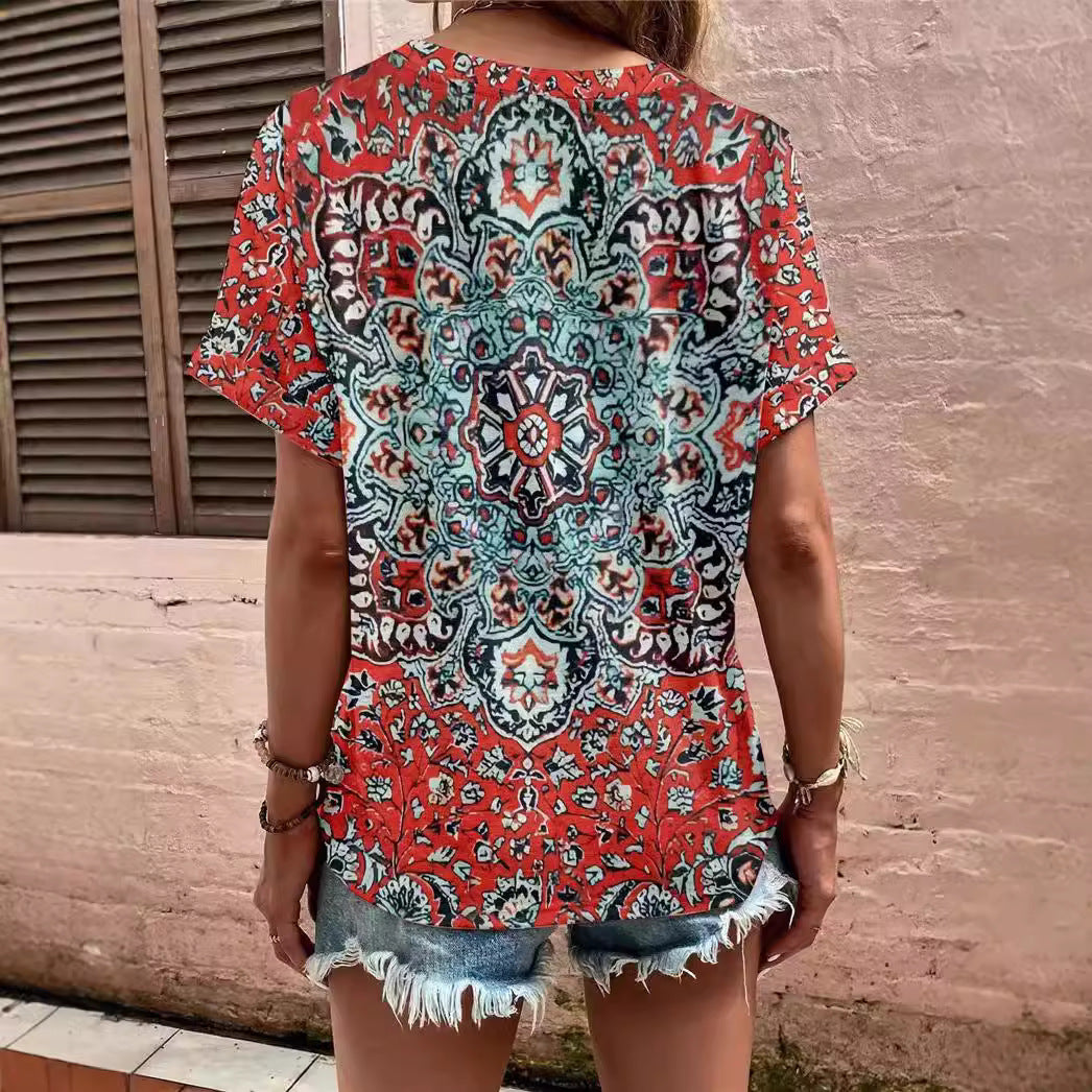 Damebluse med blomsterdesign og knaplukning Stilla