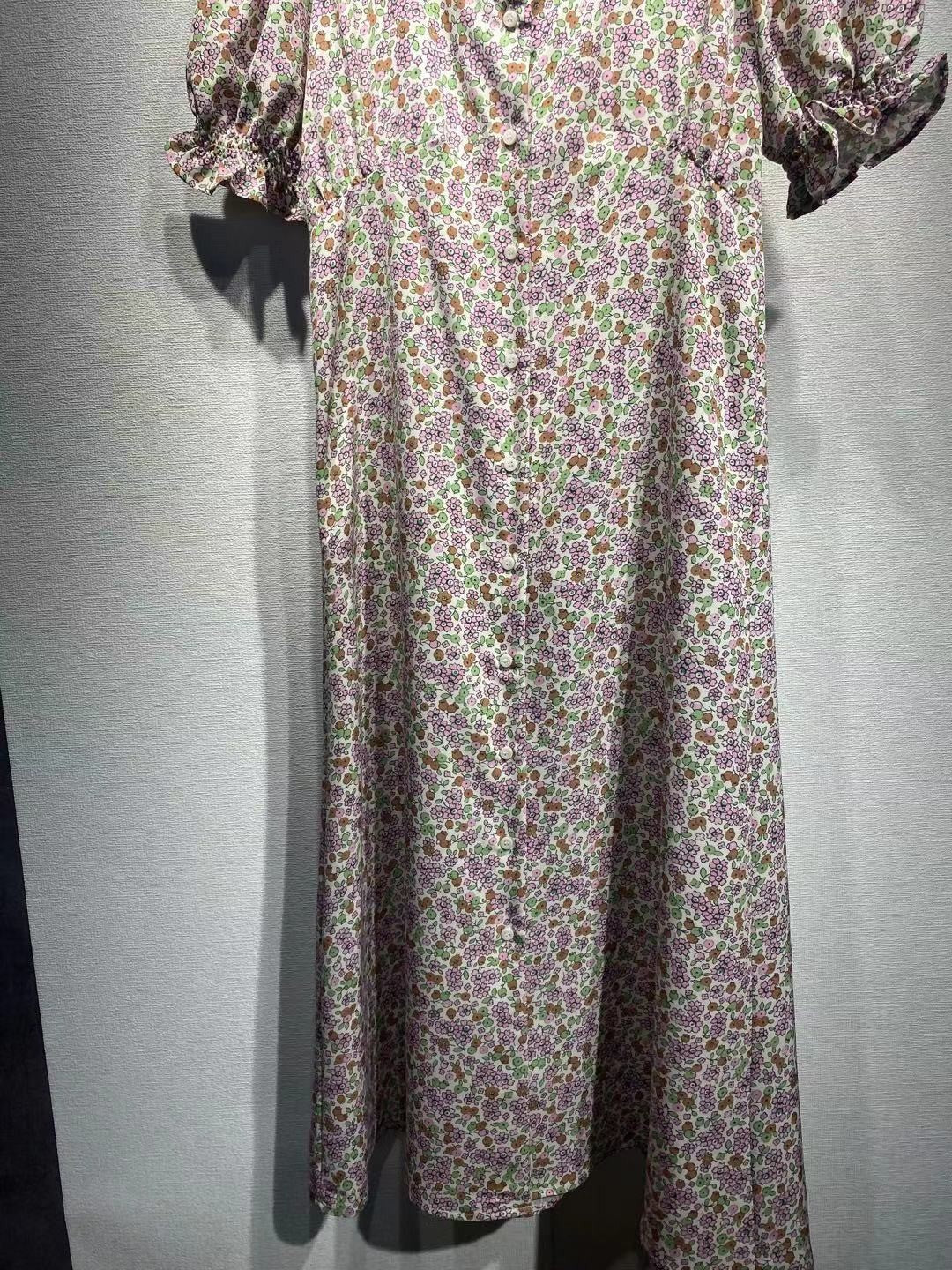 Dame Midikjole med legende blomsterprint og voluminøse ærmer Stilla