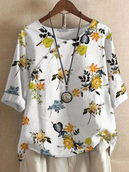 Damer bomuldsbluse med blomstertryk og elegant knaplukning Stilla