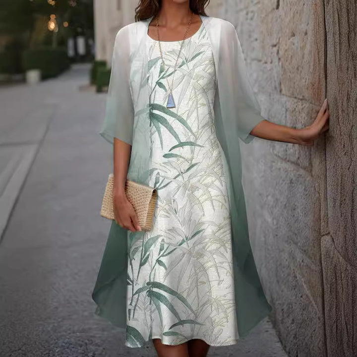 Dame elegant maxikjole med gennemsigtig chiffonoverdel og blomsterprint Stilla